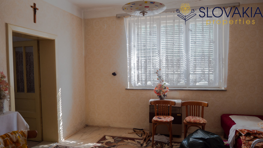 PREDANÉ Na predaj pozemok 14 á s rodinným domom